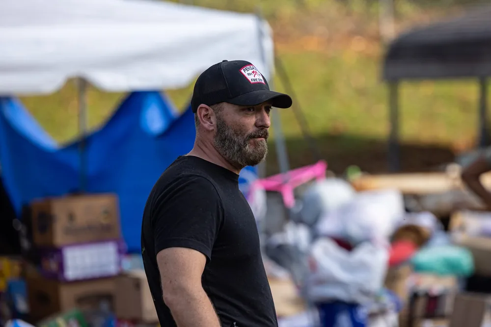 Service member helping organize supplies